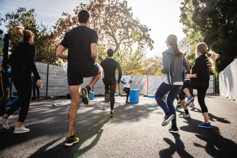 Group of people exercising outside